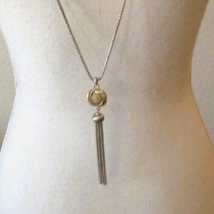36" Silver and Goldtone Cubic Zirconia Knot Necklace  Metal Silver Tone Tassel